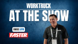 Chase Loyd of FASTER Asset Solutions stands on the show floor during Work Truck At The Show, discussing public fleet data, downtime, and funding challenges.