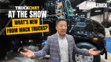 Truck Chat at the Show, What's New From Mack Trucks, Alex Lee stands in front of Mack Granite