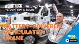 Man talking in front of a large crane truck with headline Battery-Powered Articulated Crane and logos for Truck Chat and Work Truck.
