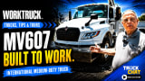 Promotional thumbnail for a Work Truck “Trucks, Tips & Tours” video featuring an International MV607 medium-duty truck and a presenter. Large text reads “MV607 Built to Work,” with a Truck Chat “Watch Now” callout.