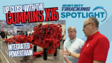 Spotlight video thumbnail showing red Cummins engine and two men discussing the powertrain