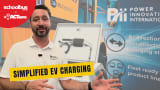 Billy Murphy of Power Innovations International speaks at ACT Expo in front of a display featuring EV charging equipment and a Blue Bird school bus graphic. A text overlay reads “Simplified EV Charging.”