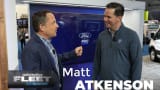 Interview of Ford executive on trade show floor. 