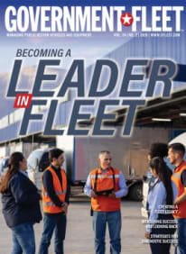 Magazine cover with a group of people talking and the words 'becoming a leader in fleet'