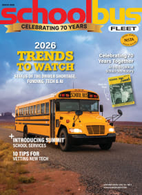 january 2026 school bus fleet magazine cover picturing a school bus driving through a picturesque desert with text that says "2026 trends to watch"