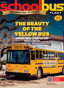 Cover of the 2026 School Bus Fleet magazine celebrating the publication's 70th anniversary. The cover features a yellow Thomas Built school bus and highlights the 2026 photo contest winners, plus stories on route planning and acclimating new riders to the school bus.