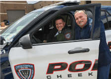 Officer smiling with an executive