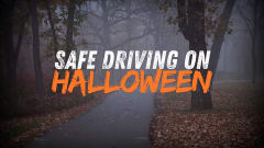 Safe Driving on Halloween over spooky fall road