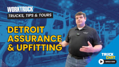 Man talking in front of a blue tinted background image of a large truck with logos for Truck Chat and Work Truck and yellow headline Detroit Assurance & Upfitting.