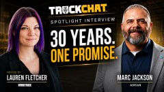 Promotional graphic for a TruckChat spotlight interview featuring Lauren Fletcher of Work Truck and Marc Jackson of Adrian. The image shows Lauren Fletcher on the left and Marc Jackson on the right against a dark industrial warehouse background. Large text reads “30 Years. One Promise.” with TruckChat branding above and “Spotlight Interview.” Lauren Fletcher is identified as the host, and Marc Jackson is identified with Adrian.