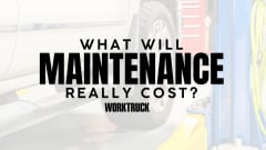 Work Truck graphic asking, “What will maintenance really cost?” over a faded image of a pickup truck on a service lift.