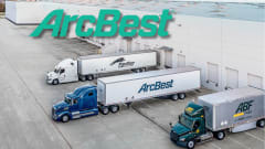 Photo of semi trucks with Panther, ArcBest, and ABF trailers backed up to docks, with ArcBest logo superimposed on top