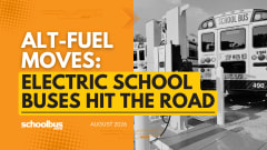 An orange and yellow graphic with a black and white image of an electric school bus with charging infrastructure and text reading "Electric School Buses Hit the Road."