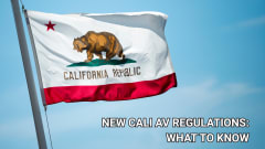 California state flag waving against a blue sky with text reading “New Cali AV Regulations: What to Know” about updated autonomous vehicle testing and deployment rules.
