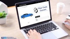 laptop with blue car on screen on a shopping website, Clear Costs Convert