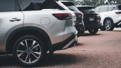 Photo of multiple new SUVs on a car dealership lot