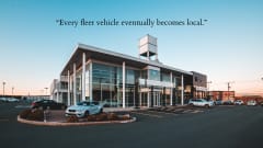 A car dealership with added inscription "Every fleet vehicle eventually becomes local." 