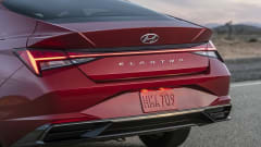 A rear view of a red Hyundai Elantra
