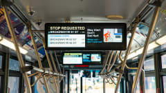 A Hitachi Rail screen on public transit.