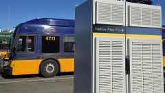 a battery electriv city bus and a Heliox battery charger