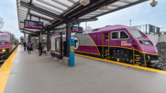 An MBTA commuter rail at a station.