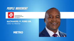 Blue and white graphic with a professional portrait of Nathaniel P. Ford Sr.