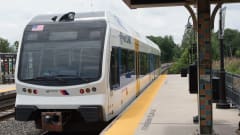 An NJ TRANSIT railcar at a station