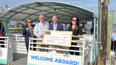 PSTA, City of Dunedin, and Congresswoman Anna Paulina Luna during a check ceremony for restoration of the Dunedin Pier