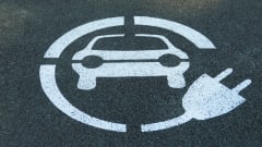 pavement with car and charger wrapped around it painted on