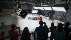 Attendees watch a live vehicle crash test at the IIHS Vehicle Research Center, where fleet professionals can observe safety testing and advanced crash-avoidance technologies in action.