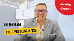 Thumbnail graphic for a School Bus Fleet interview at ACT Expo featuring a smiling BetterFleet executive seated in front of a fleet technology booth display. Overlay text reads “BetterFleet” and “The G Problem in V2G.”