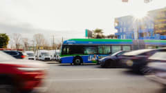 A blurry TransLink R2 rapid bus