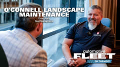Chris Brown and O'Connell Landscape Maintenance rep sit across from each other during an interview at Geotab Connect 2026.