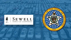 Graphic showing Sewell Family of Companies logo and Oklahoma state seal over a background of parked vehicles, representing a statewide fleet contract agreement.