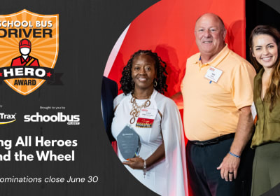Promotional graphic for the School Bus Driver Hero Award. Text reads "Calling All Heroes Behind the Wheel" and notes that nominations close June 30. Sponsored by AngelTrax and presented by School Bus Fleet. The image includes the award logo and a photo the 2025 winner at an awards event.