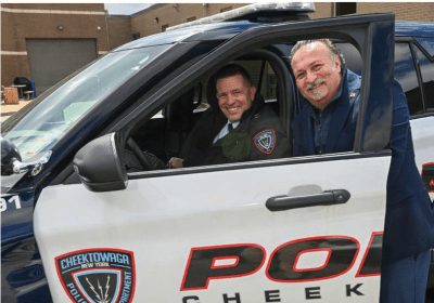 Officer smiling with an executive