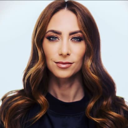 A woman with long brunette hair