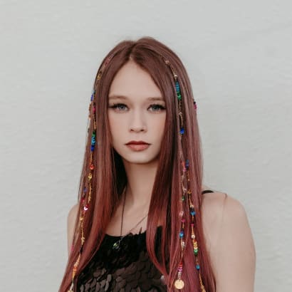 A young woman with long hair.
