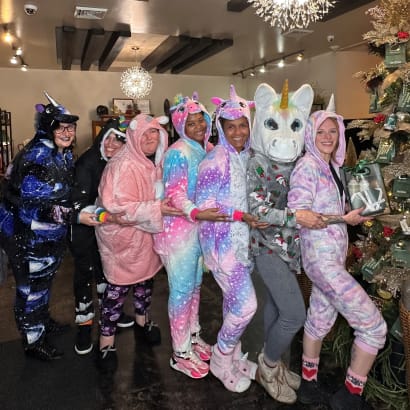 The Soleil Team dresses as unicorns.