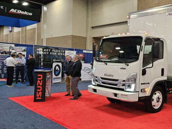 White Isuzu cabover medium-duty truck