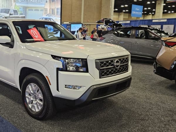  White Nissan Frontier on the NAFA expo floor. 