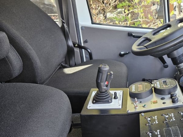 Interior cabin view of Monterra 6x6 looking out driver door