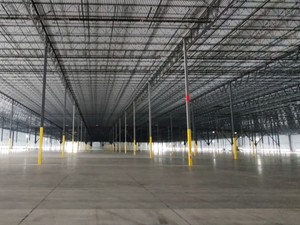Interior photo of a really large, empty building.
