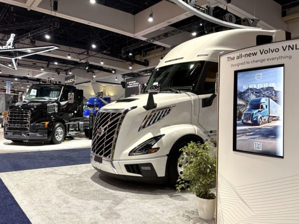 Volvo and Mack trucks at ATA MC&E expo