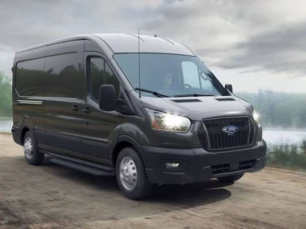 Alt Caption: Ford Transit cargo van used in commercial fleet operations.