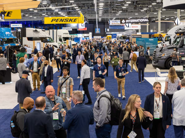 Crowd of people on an expo show floor