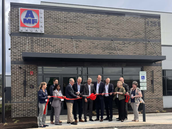 AMF Bruns executives and local officials cut ribbon at grand opening of new Stow, Ohio facility