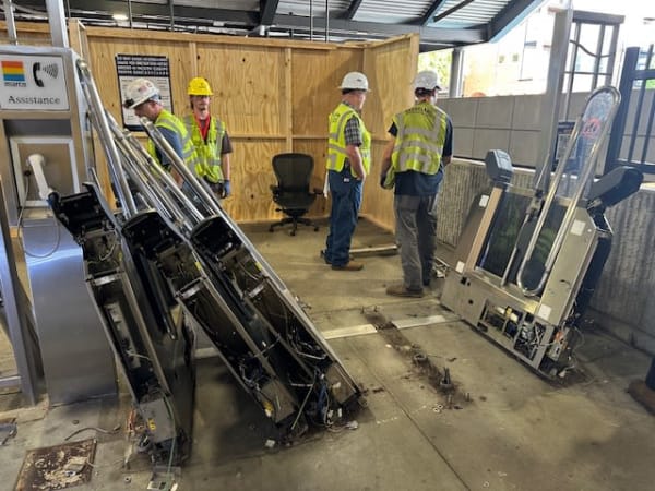 Construction crews installing the first array of better Breeze faregates at Lindbergh Center Station.