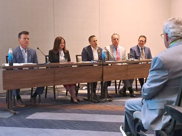 The bus roundtable with officials from APTA, GIllig, New Flyer, and the public transit industry