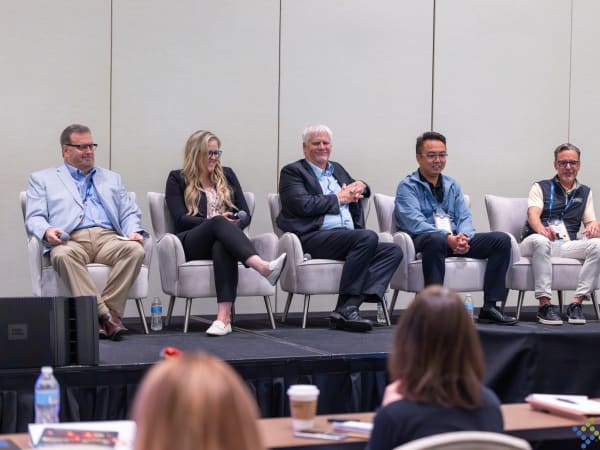 Representatives from leading school bus manufacturers participate in an OEM panel discussion covering vehicle technology, alternative fuels, regulations, and future product developments.